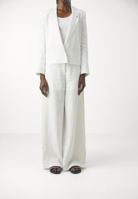 Armani Exchange PANTALONI - Pantaloni - optic white