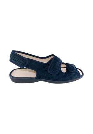 Sandalia ortopédica azul marino con puntera abierta, tiras de velcro ajustables y plantilla beige acolchada.