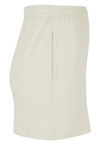 Pantalones cortos de rizo en color beige claro con cinturilla elástica, bolsillos laterales y una textura suave, con un diseño sencillo y corte recto.