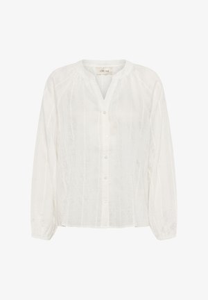 Balta lininė bluzonė su apvalia iškirpte, ilgomis rankovėmis, mygtukų uždarymu ir subtiliais vertikaliais raštais.