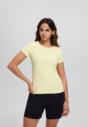Rukka MANKALA - T-shirt basique - pastelgelb