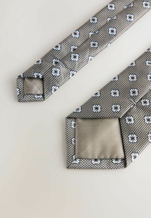 Grau gemusterte Krawatte mit kleinen weißen Blumendesigns, gefaltet dargestellt, um die Vorderseite und das Rückfutter auf hellem Hintergrund zu zeigen.