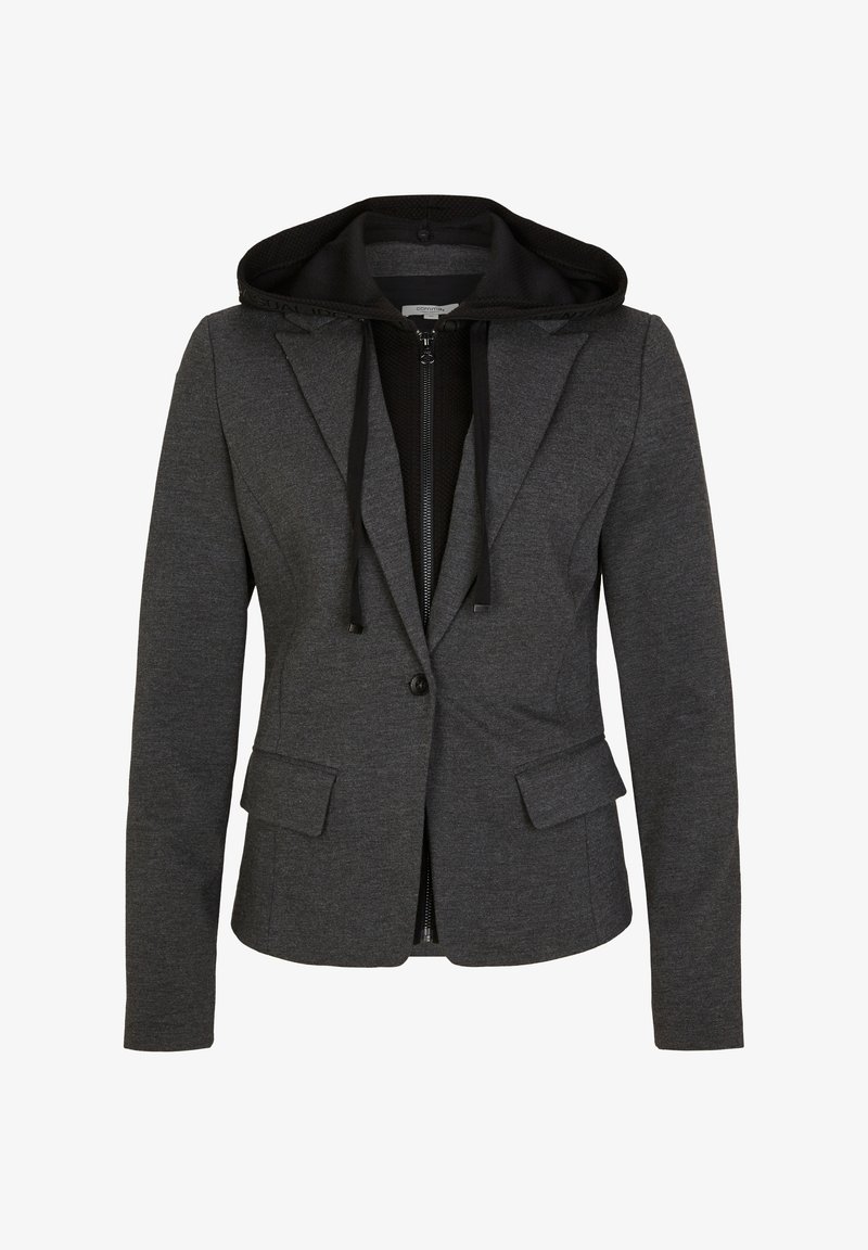 Blazer gris charbon avec revers et bouton sur le devant, porté sur un sweat à capuche noir zippé avec cordons.