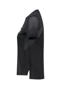 Svart idrottströja med meshpanel på axeln, korta ärmar och figurnära design, tillverkad av lätt och andningsbart material.