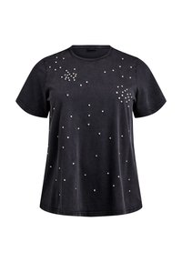 T-shirt en coton noir à manches courtes, avec des clous métalliques dispersés de tailles variées sur le devant et un col rond.