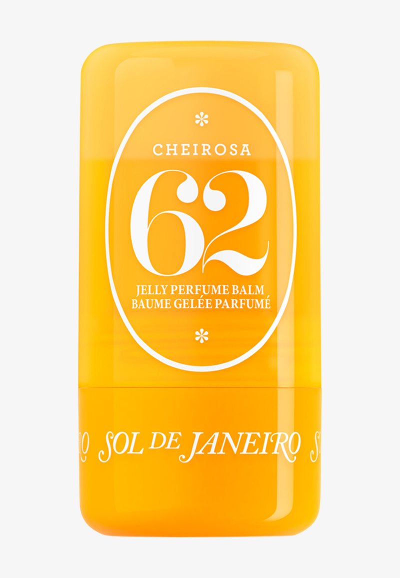 Bálsamo en barra de color amarillo brillante etiquetado como "Cheirosa 62 Jelly Perfume Balm" de Sol de Janeiro.