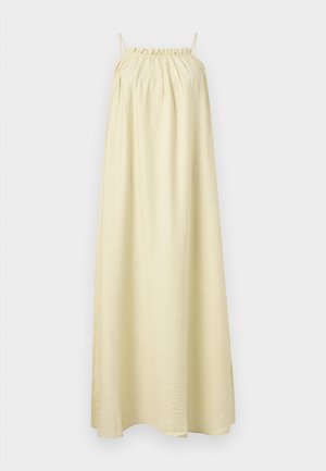 Haljina bez rukava do poda od svijetlo žutog materijala. Ima naborani izrez i glatku, lepršavu teksturu. Jednostavan A-linijski silueta.