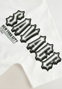 Unselected, white savage back print