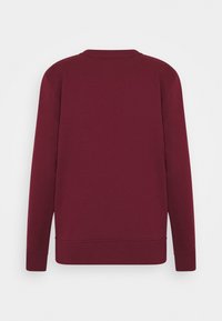 Bordeauxrode trui met lange mouwen, ronde hals, geribbelde manchetten en zoom. Gemaakt van gladde stof met een minimalistisch ontwerp, achterkant getoond.