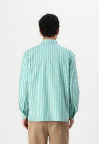 Marimekko JOKAPOIKA UNISEX - Pogājama blūze - light green