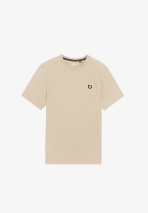 Beige cotton t-shirt with short sleeves, round neckline, and a small yellow embroidered logo on the left chest. Plain design, soft texture.