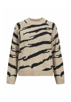 Beżowy sweter w czarne paski tygrysa. Wykonany z fakturowanego materiału typu dzianina, z okrągłym dekoltem i długimi rękawami. Żebrowany dół.