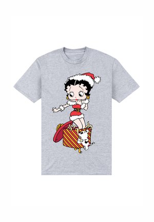 Camiseta gris de manga corta con un personaje de dibujos animados vestido con un traje rojo y blanco, de pie sobre una caja de regalo a rayas junto a un perrito.