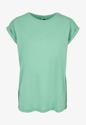 Mintgrünes T-Shirt mit kurzen Ärmeln aus weicher Baumwolle. Verfügt über einen runden Halsausschnitt und einen lässigen, lockeren Schnitt mit umgeschlagenen Ärmeln.