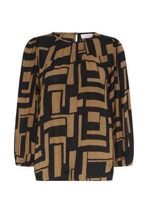 Blouse à manches longues en tissu noir et beige avec un motif géométrique, encolure ronde, coupe ample avec des poignets froncés et une fermeture éclair au dos.