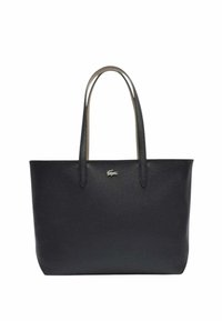Sac fourre-tout en cuir noir avec deux poignées, texture lisse, design minimaliste et petit logo en argent. Forme structurée, sans motifs.