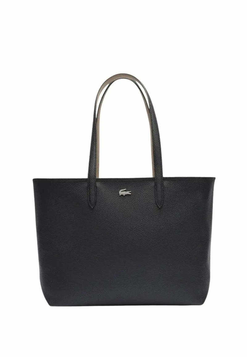 Sac fourre-tout en cuir noir avec deux poignées, texture lisse, design minimaliste et petit logo en argent. Forme structurée, sans motifs.