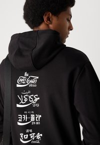 Antony Morato HOODIE BOXY FIT WITH FLOCK AND RUBBER INJECTION LOGO PRINT - Sweater - black