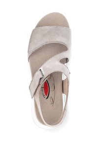 Gray suede sandal with cross straps and a metal buckle. Soft insole with red and black logo. Open toe design, lightweight with curved edges.