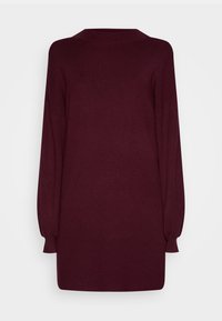 Bordeaux farbenes Strickkleid mit entspannter Silhouette, hochgeschlossenem Kragen und langen Ärmeln. Weicher Stoff und leicht taillierte Bündchen.