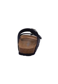Navy blue sandal with two adjustable straps, cork footbed, and rubber outsole. Features a metallic buckle accent on the upper strap.