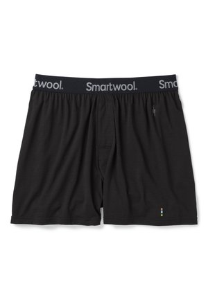 Schwarze Boxershorts aus weichem Stoff mit einem grauen Smartwool-Logobund. Sie verfügen über eine Öffnung vorne und ein kleines farbenfrohes Akzentdetail.