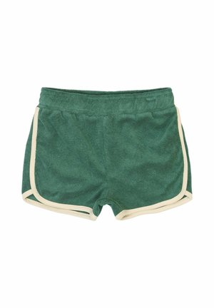 Zelené šortky z froté látky s jemnou textúrou, s béžovým lemovaním pozdĺž okrajov a elastickým pásom.