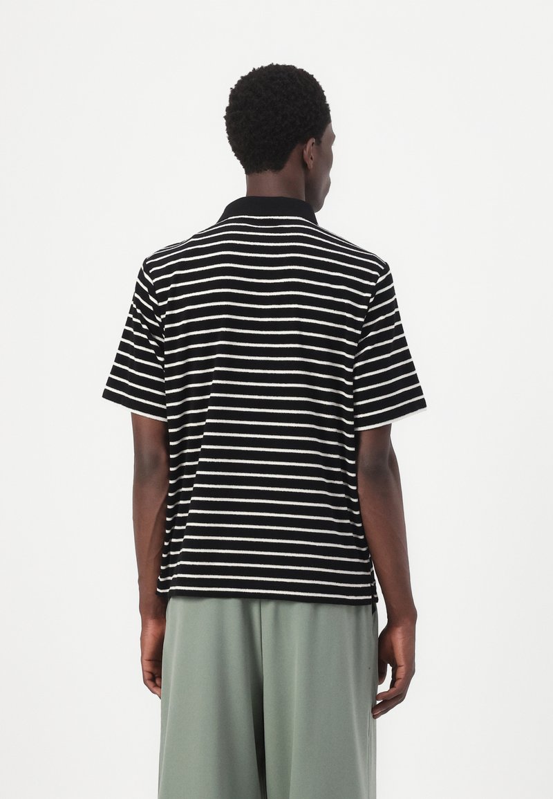 Jack & Jones JORGEN STRIPED - Polo shirt - black - Zalando.ie