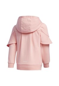 Růžová mikina s kapucí vyrobená z měkké tkaniny. Má oversized rukávy, rozdělený zadní design a žebrovaný lem s logem "AEROREADY".