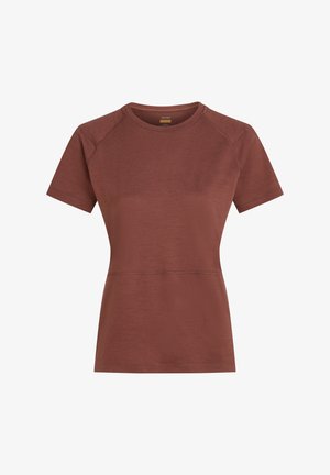Kortärmad, rostfärgad jersey t-shirt med en strukturerad yta, raglanärmar och en figurnära silhuett. Har sömnadsdetaljer.