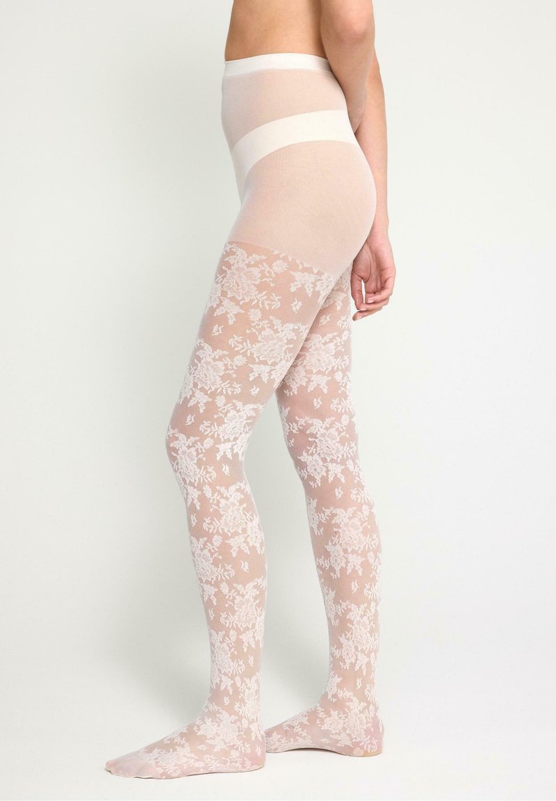 Lace-patterned tights featuring a light pink floral design, with a solid waistband and sheer legs. Material appears soft and delicate.