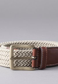Woven beige belt with a braided texture, featuring a bronze metal buckle and a brown leather accent near the buckle for added detail.