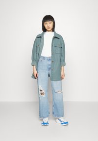 Dr.Denim Petite ECHO - Calças de ganga de corte relaxado - empress light blue