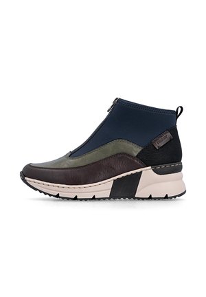 Ankle-high sneaker boot with brown, green, and navy leather panels, front zipper, black pull tab, and beige rubber sole with black tread.