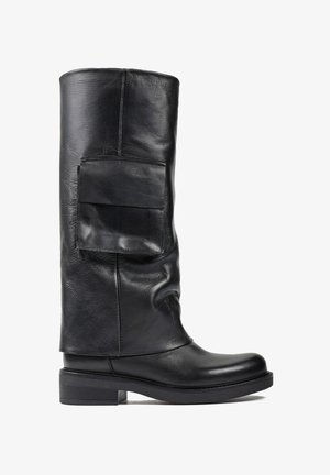 - Kowbojki i obuwie motocyklowe