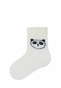 Calzino bianco in cotone con un design di faccia di panda nera sulla parte superiore. Fondo a coste e texture liscia su tutta la superficie. Lunghezza classica alla caviglia.