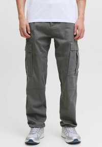 Grå arbeidsbukser laget av bomullsblanding, med flere sidelommer, en ledig passform og synlige sømdetaljer.