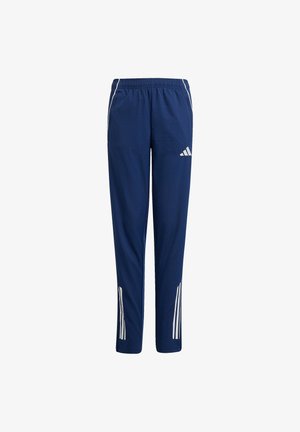 Pantalons de sport navy en tissu léger. Comprend une taille élastique, des bandes blanches sur les côtés et un petit logo près de la hanche.
