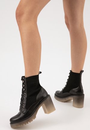 Wojas Platform ankle boots - black