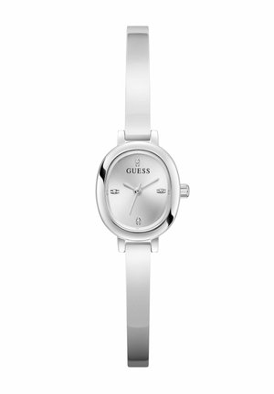 Montre Guess en argent avec un cadran rectangulaire, des marqueurs d'heure minimalistes et un bracelet en métal brillant. Présente une couronne simple sur le côté.