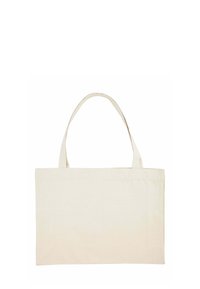 Borsa tote in canvas di colore beige naturale, forma rettangolare, con due manici resistenti. Presenta una superficie texture con cuciture visibili.
