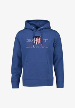 Blue hooded sweatshirt with front pocket, drawstrings, and "GANT 1949 American Sportswear" logo with shield design on chest.