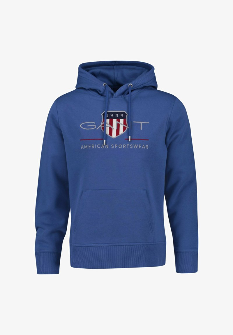 Sweat à capuche bleu avec poche avant, cordons de serrage et logo "GANT 1949 American Sportswear" avec motif de bouclier sur la poitrine.