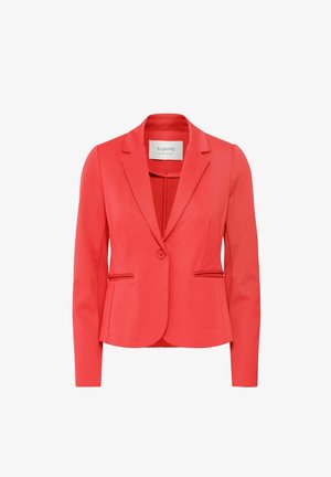 Koralli bleiser, millel on kohandatud disain, ühekohaline lukustus ja kaks esist taskut. Sile kangas ja nurgapead loovad poleeritud välimuse.