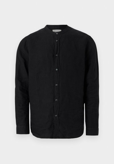 Μαύρο μακρυμάνικο πουκάμισο από λινό με κινεζικό γιακά, κλείσιμο με κουμπιά μπροστά και ελαφρώς υφασμένο ύφασμα.