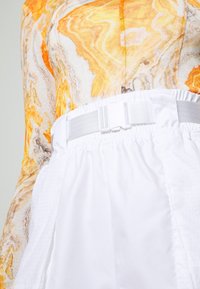 Nike Sportswear Träningsbyxor - white