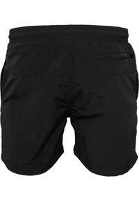 Černé šortky vyrobené z lehké tkaniny, s elastickým pasem, bočními kapsami a kapsou na zip na zadní straně. Hladký povrch, jednoduchý design.