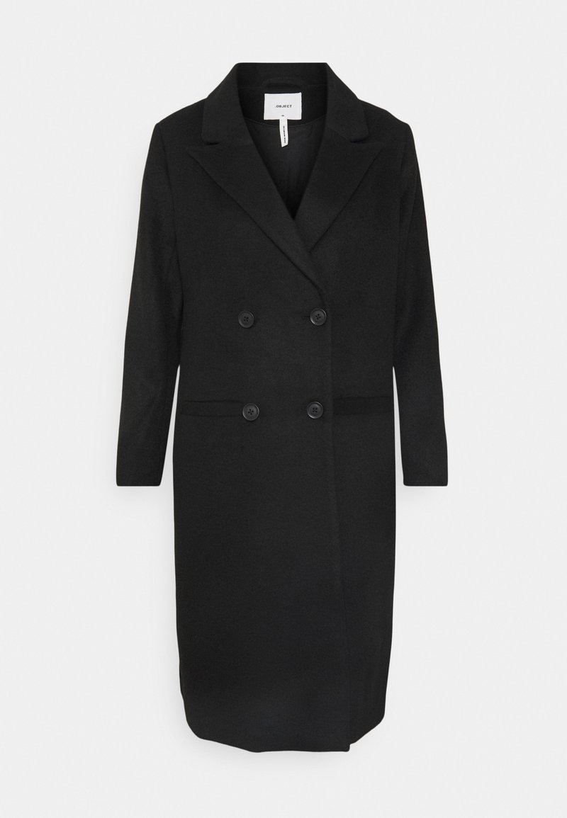 Manteau long noir croisé avec revers à encoches, quatre boutons, manches longues et deux poches fendues horizontales.