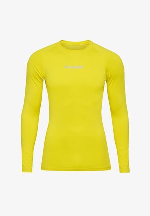 T-shirt de sport à manches longues de couleur jaune vif. Tissu lisse et léger avec une coupe ajustée. Présente un petit logo blanc sur la poitrine.