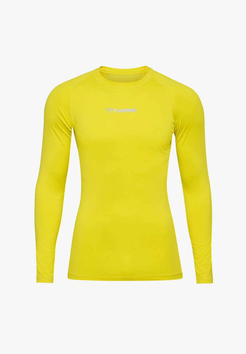 Langærmet atletisk skjorte i klar gul. Glat, letvægtsstof med en tætsiddende pasform. Har et lille hvidt logo på brystet.
